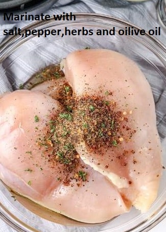 Marinated chicken breast with spices,herbs and oilive oil